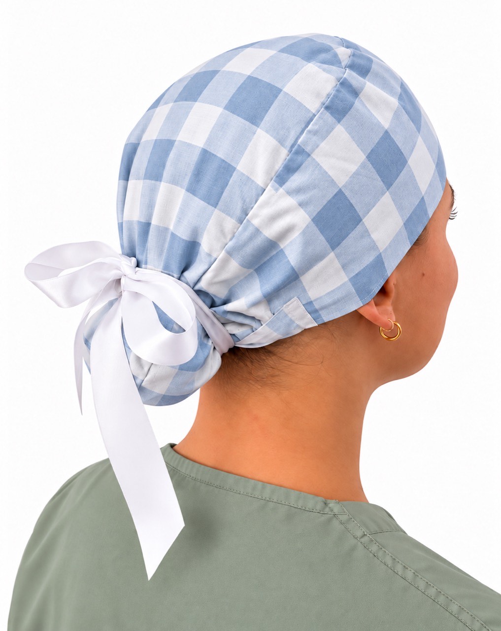 Women’s blue-and-white gingham scrub cap shown from the back, with a white ribbon tie