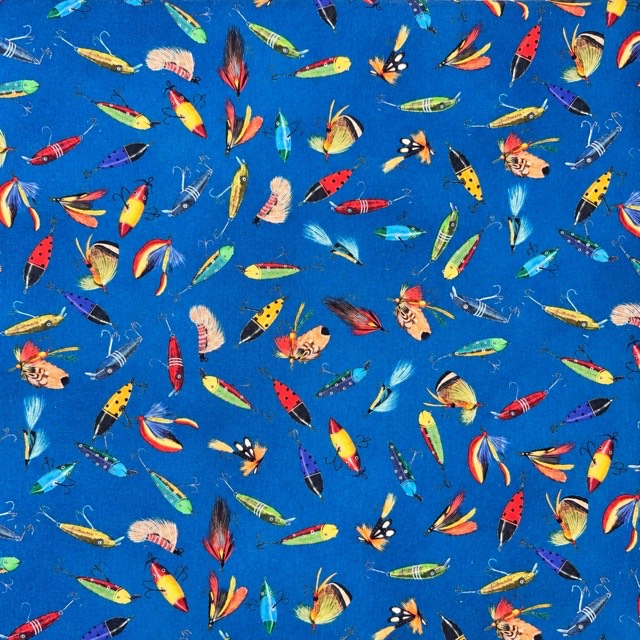 Colorful fishing lures and flies on bright blue.
