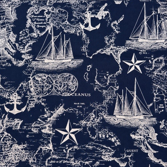 Ivory sailboats, anchors, compass roses, and maps on navy.